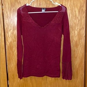red v-neck sweater